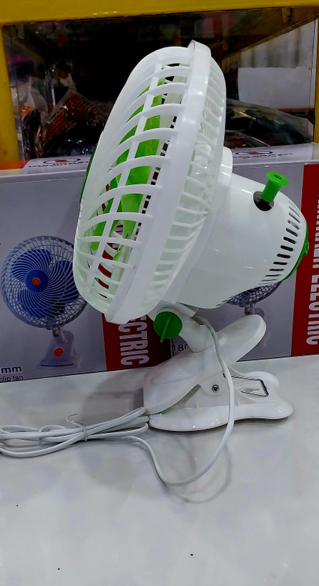 پنکه رومیزی گیره ای چرخشی ۳ پره با حفاظ